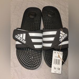 Adidas sandals, 11 in man 12 in women new with tags